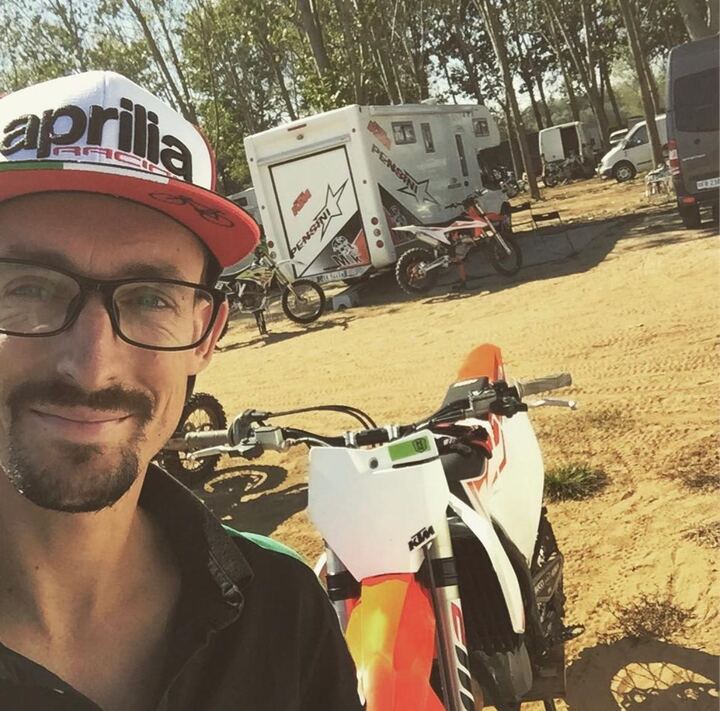 Luca Corradini with his rally bike in the paddock